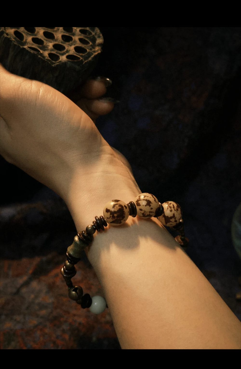 Tiger-Stripe Seed & Bamboo-Joint Bracelet in scene